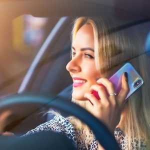 Woman Using Phone While Driving